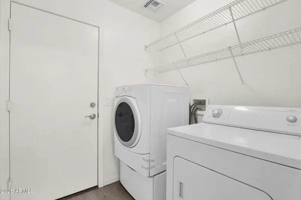 a utility room with dryer and washer