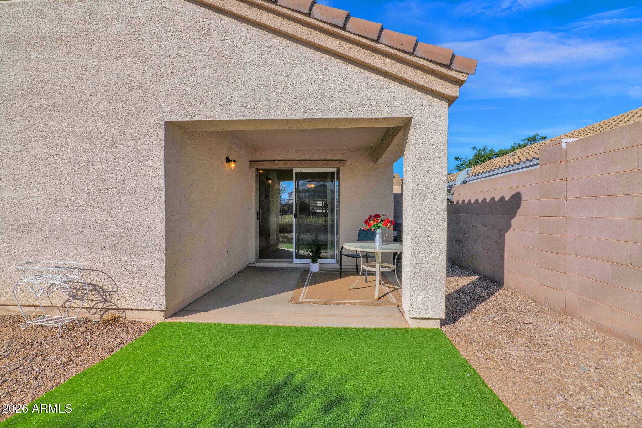 429 South Labelle Mesa, AZ 85208 - Photo 27 of 35 a view of a backyard with table and chairs and potted plants