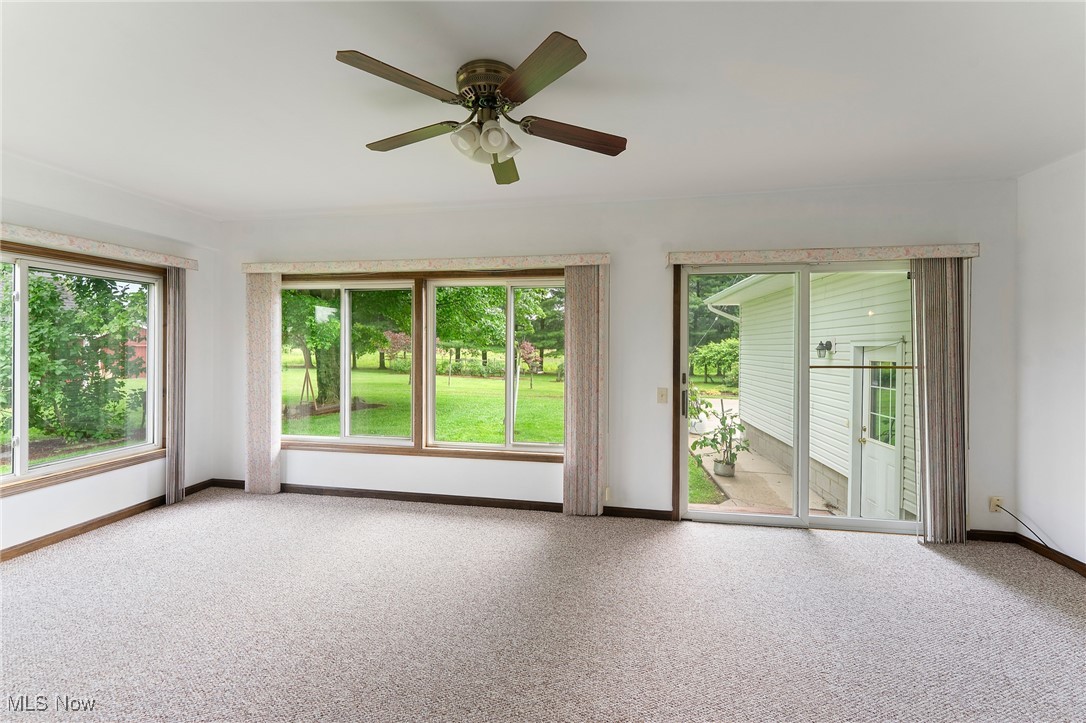 744 Johnson Plank Road Warren, OH 44481 - Photo 14 of 39 Sunroom with plenty of natural sunlight.