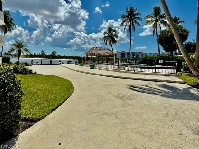 a view of a chairs and tables in the patio