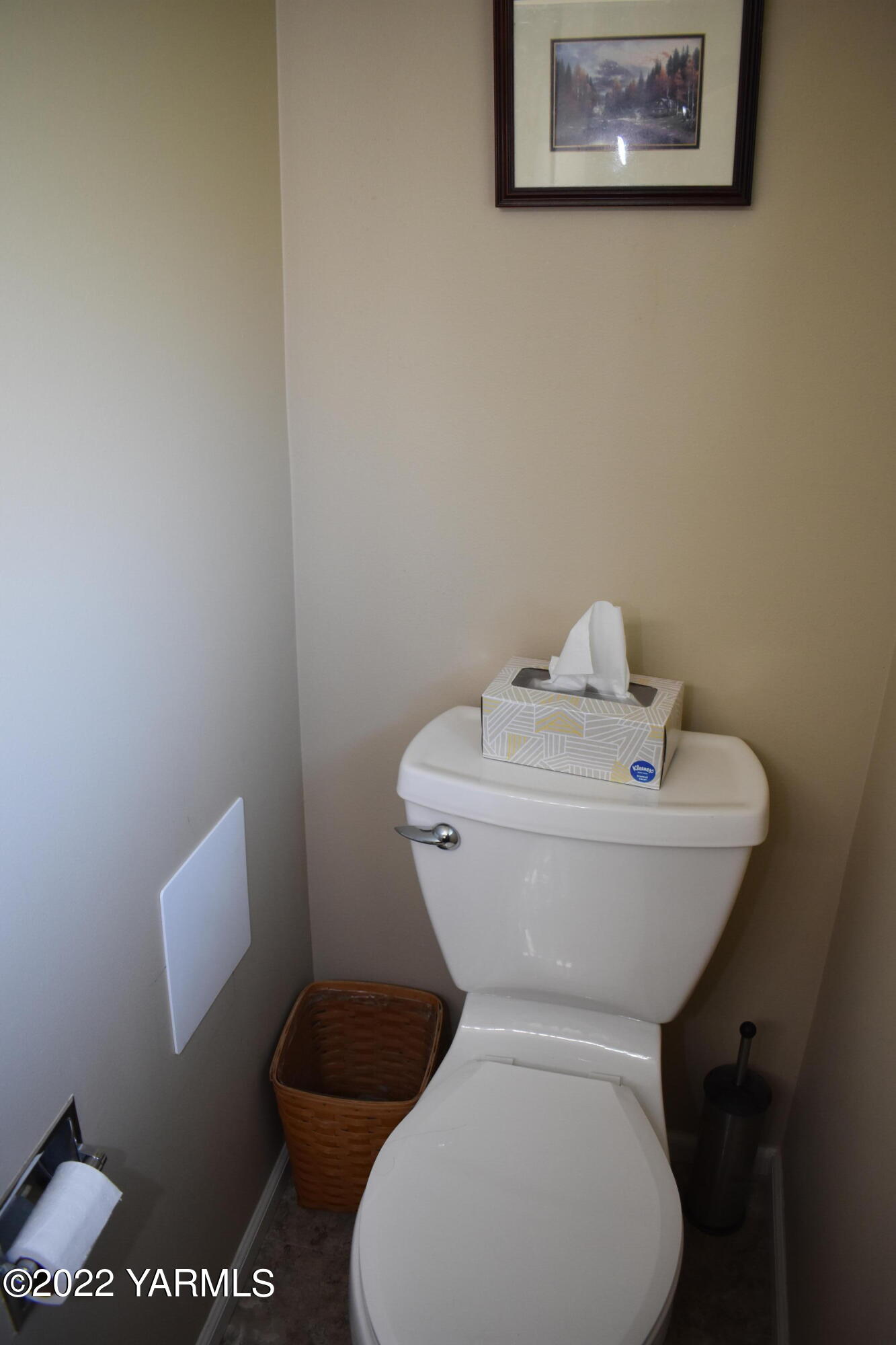 91 Elliott Road Cowiche, WA 98923 - Photo 28 of 46 a white toilet sitting next to a bathroom sink