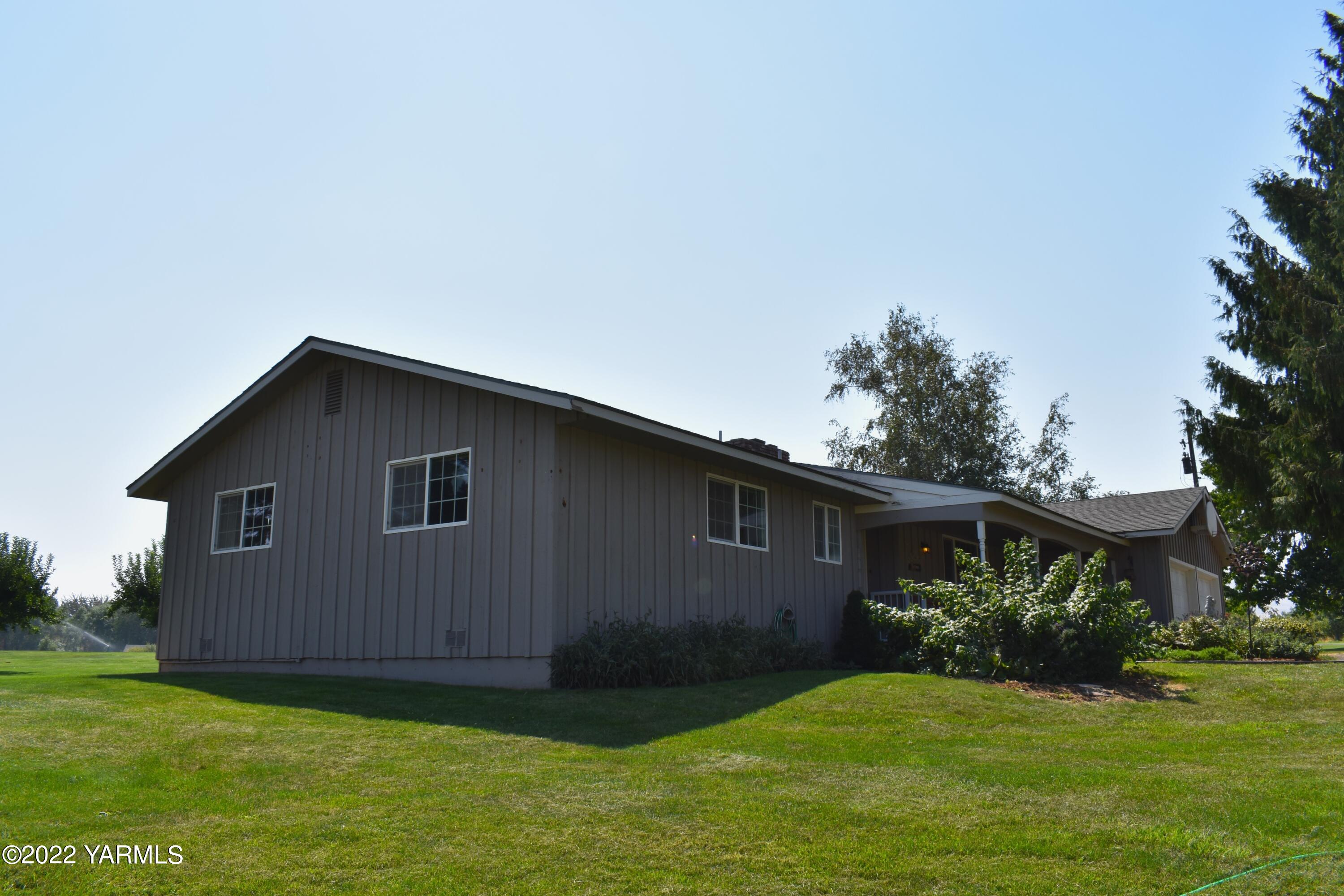 91 Elliott Road Cowiche, WA 98923 - Photo 44 of 46 a house view with a garden space