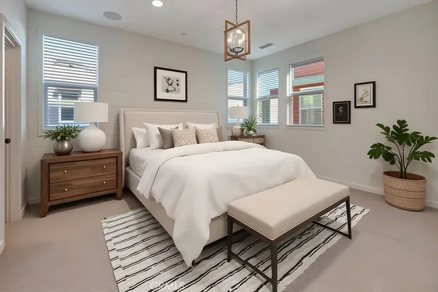 a bedroom with bed and a window