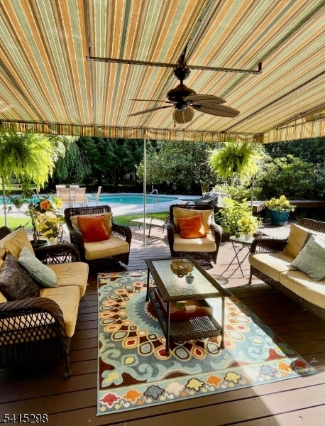 447 Rockaway Valley Road Boonton, NJ 07005 - Photo 17 of 29 a outdoor space with patio couch and a fireplace