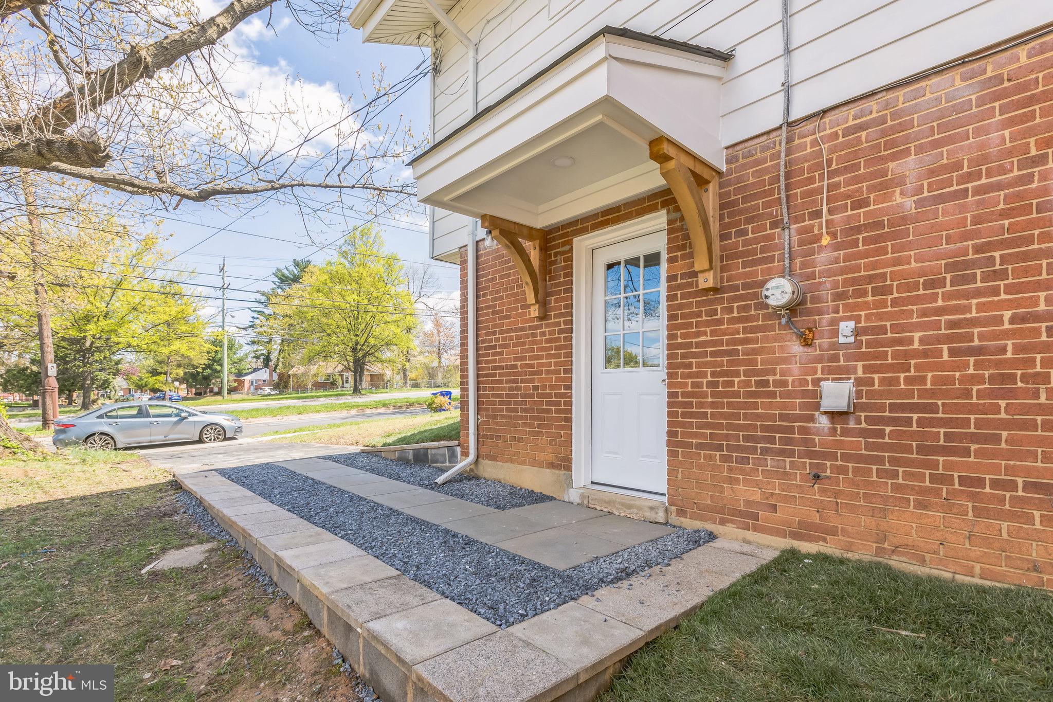 11308 Veirs Mill Road Silver Spring, MD 20902 - Photo 21 of 21 a view of a house with a small yard