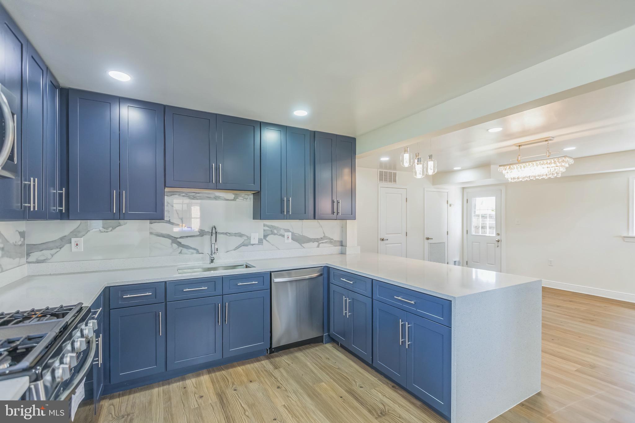 11308 Veirs Mill Road Silver Spring, MD 20902 - Photo 10 of 21 a kitchen with a sink and cabinets