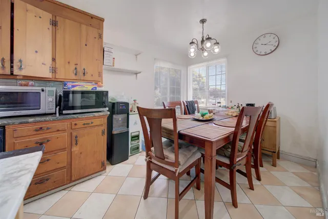 a kitchen with stainless steel appliances granite countertop a sink and a stove