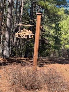 0 Sunset Drive, Unit 20 Mill Spring, NC 28756 - Photo 4 of 20 a sign that is sitting in the middle of a yard