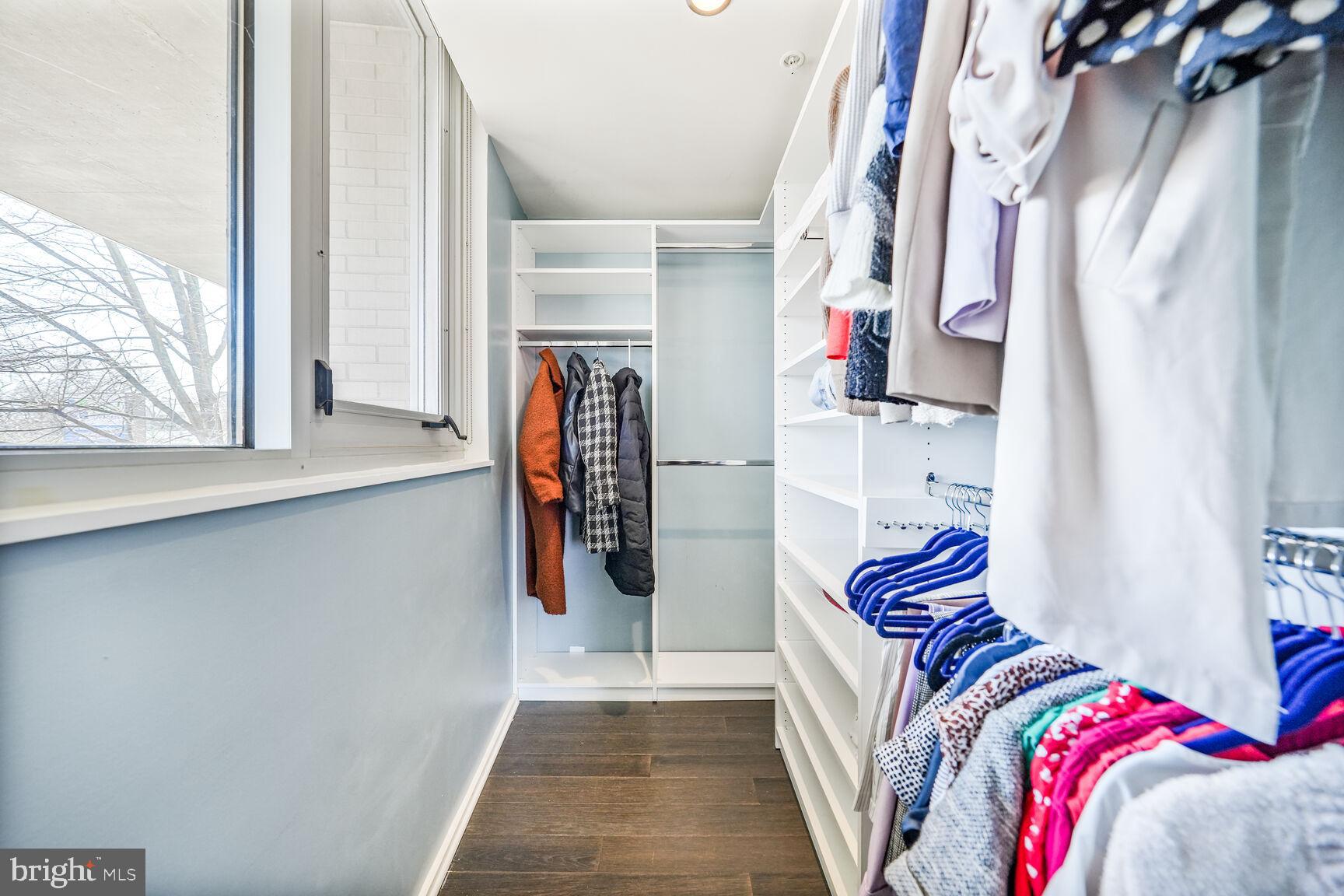 3409 Wilson Boulevard, Unit 211 Arlington, VA 22201 - Photo 13 of 30 a view of walk in closet with clothes and shoes