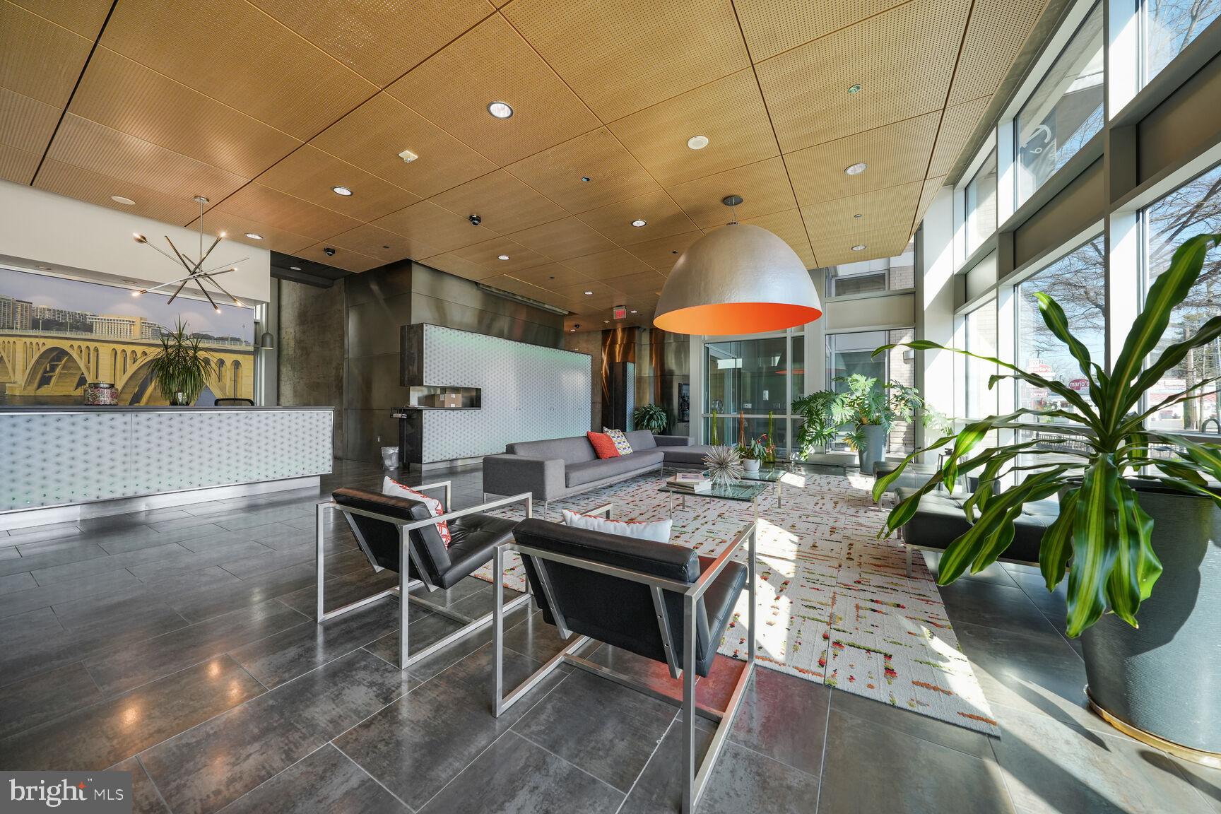 3409 Wilson Boulevard, Unit 211 Arlington, VA 22201 - Photo 21 of 30 a outdoor space with lots of table and chairs