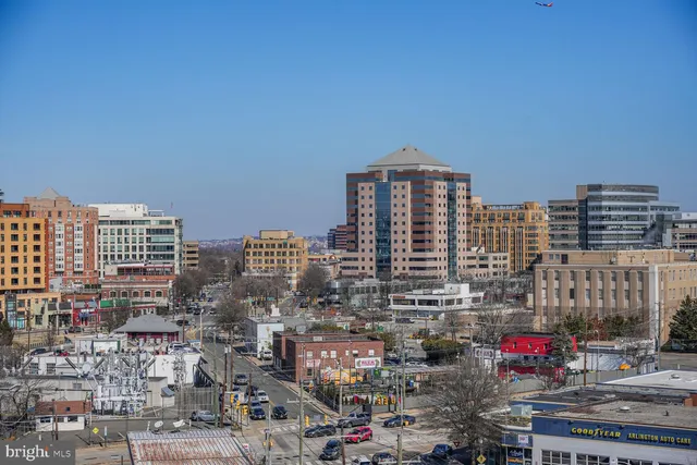 a view of city with tall buildings