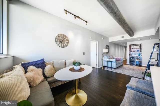 a view of a livingroom with furniture and a table