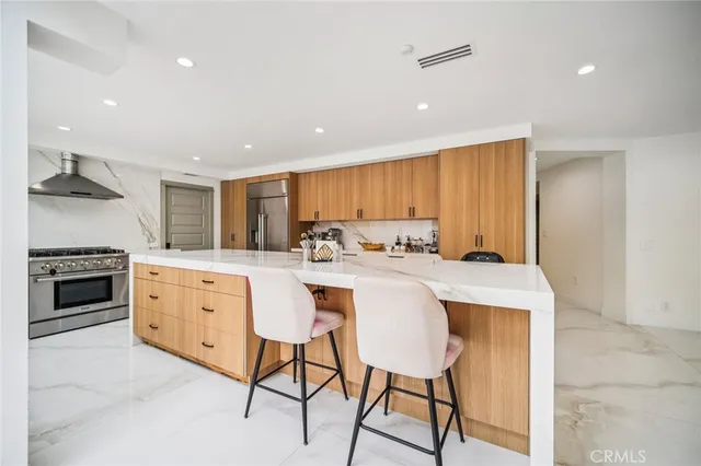 a bathroom with a mirror and a toilet