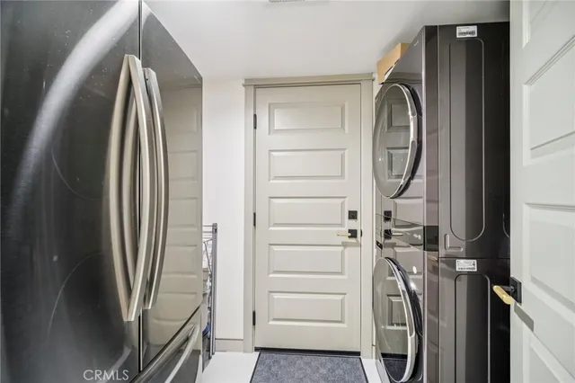 a spacious bedroom with a bed and a view of bathroom