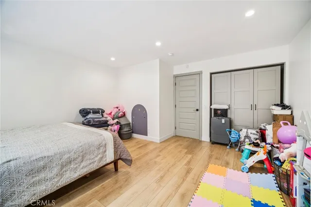 a bathroom with a tub sink mirror and shower