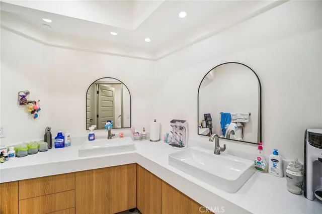 a front view of a house with a garden and porch