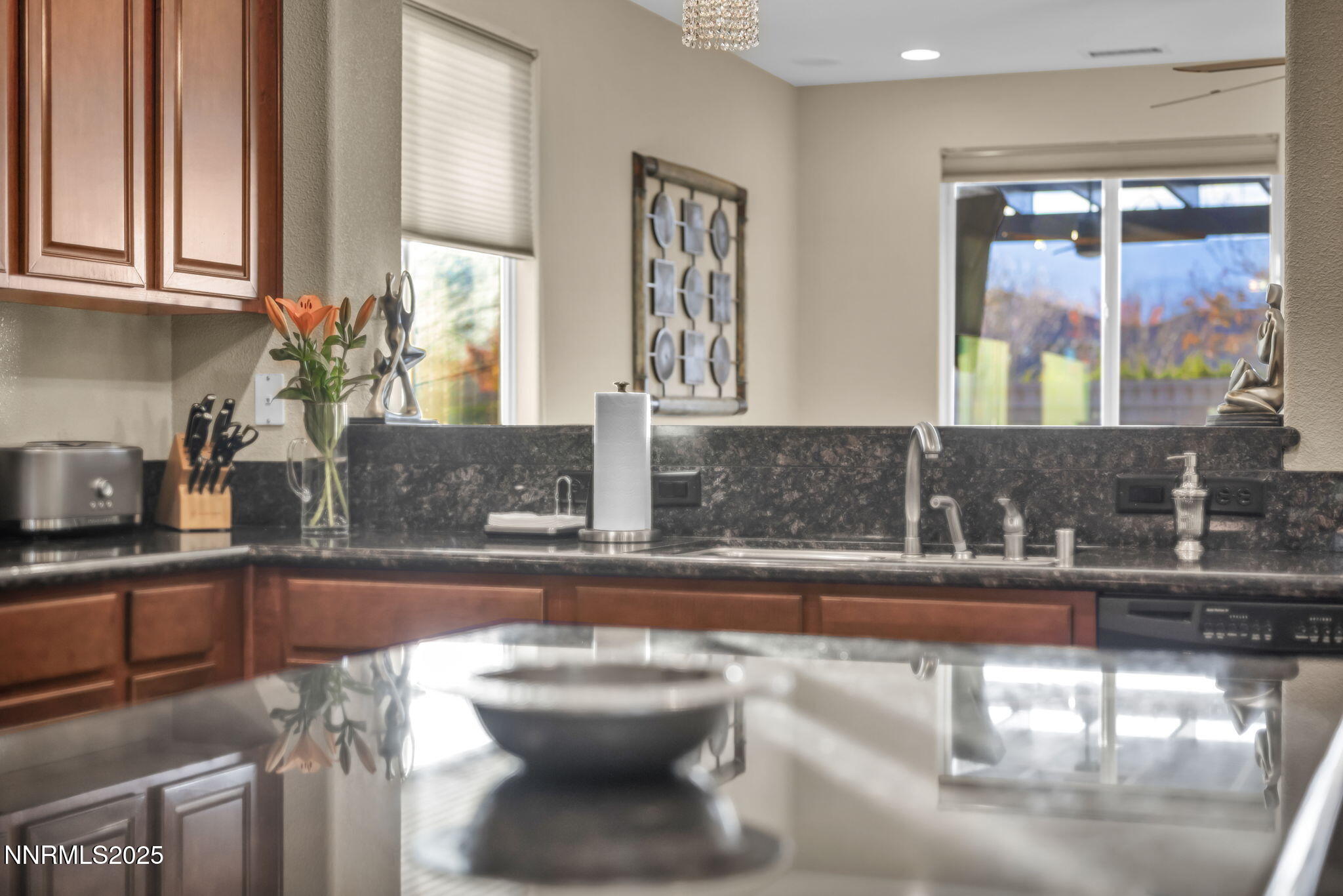 11375 Messina Court Reno, NV 89521 - Photo 14 of 52 a kitchen with a sink and a window