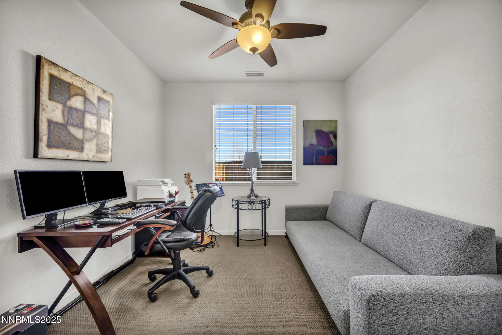 11375 Messina Court Reno, NV 89521 - Photo 20 of 52 a workspace with a couch and a window