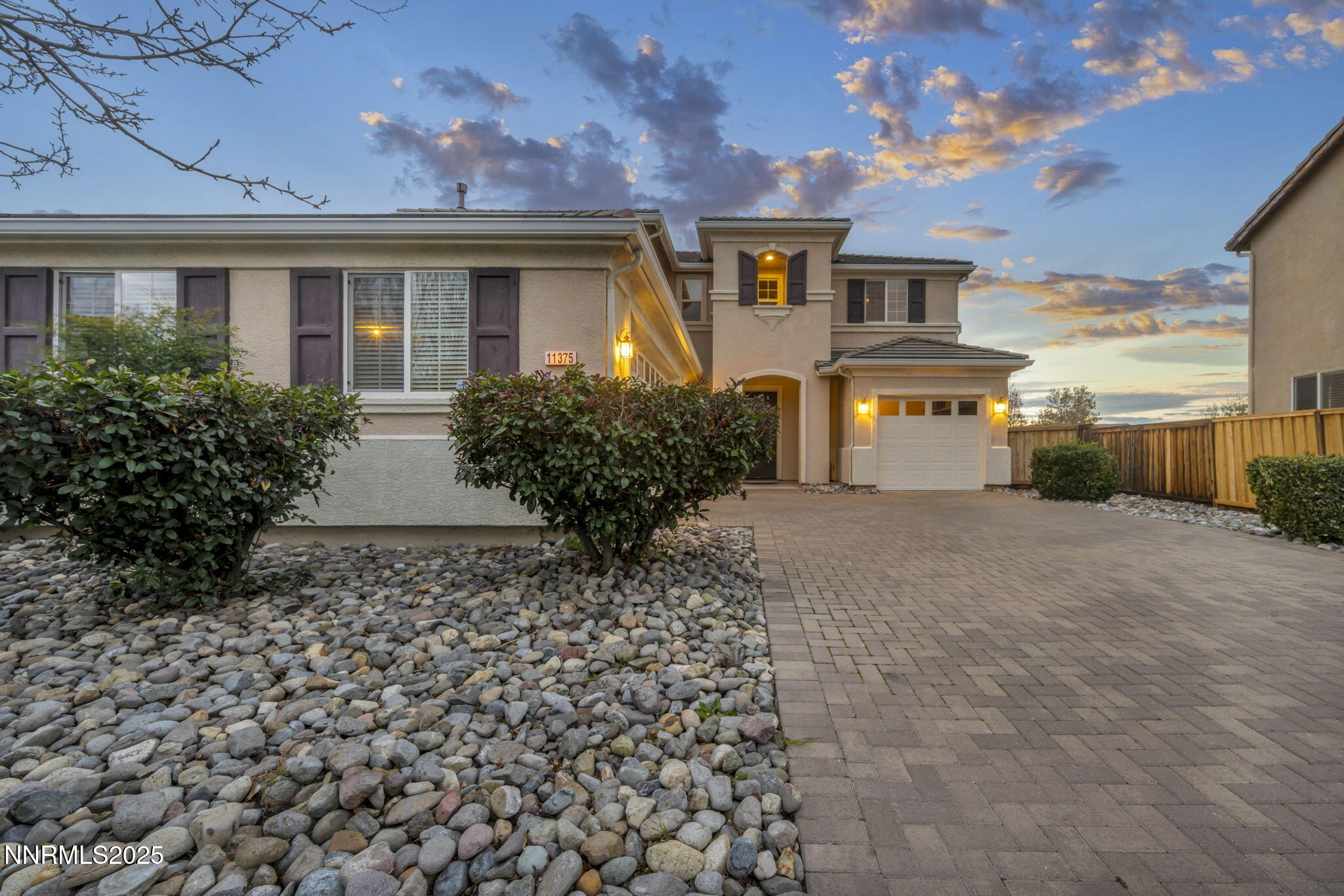 11375 Messina Court Reno, NV 89521 - Photo 2 of 52 a front view of a house with garden