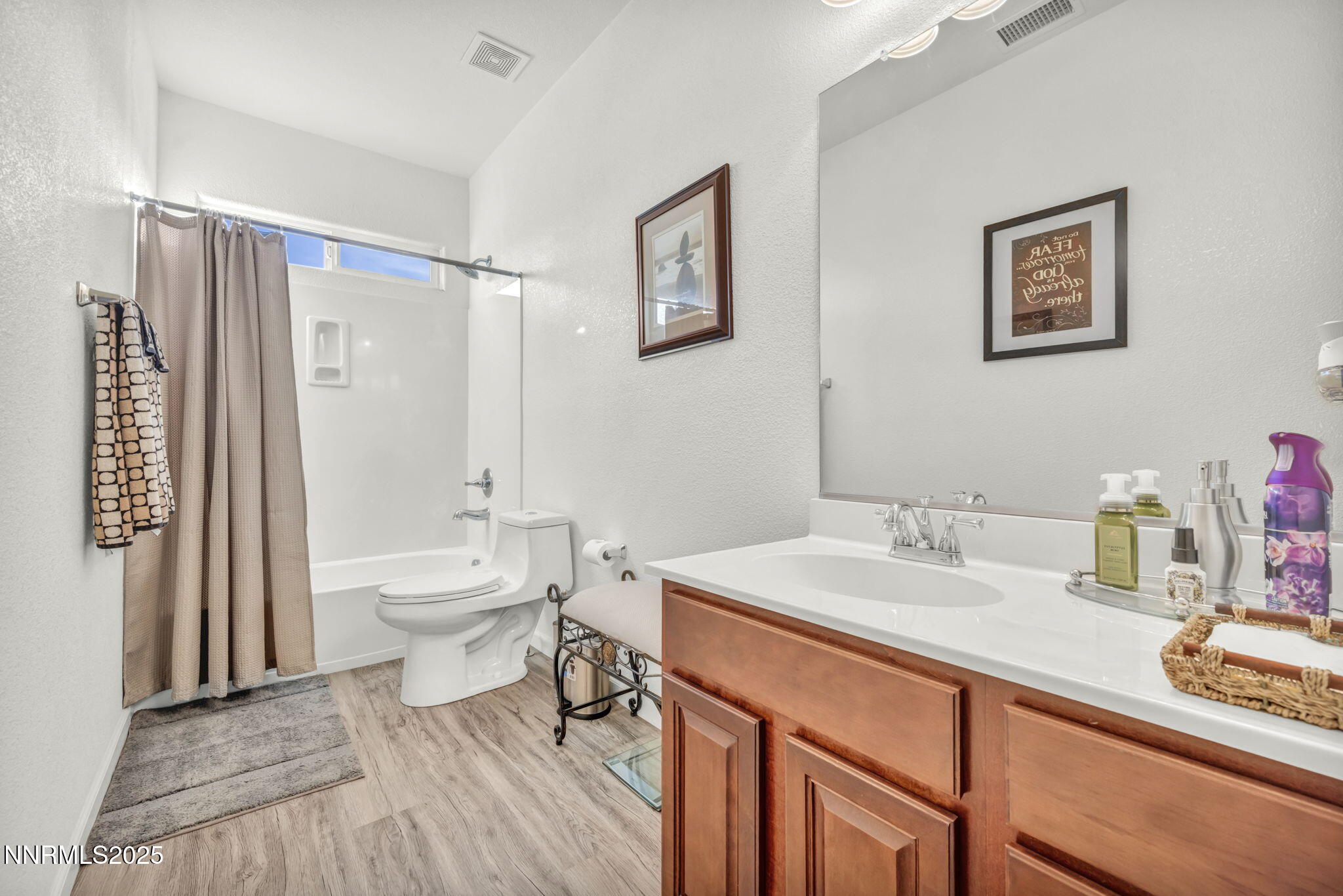 11375 Messina Court Reno, NV 89521 - Photo 30 of 52 a bathroom with a sink a toilet and shower