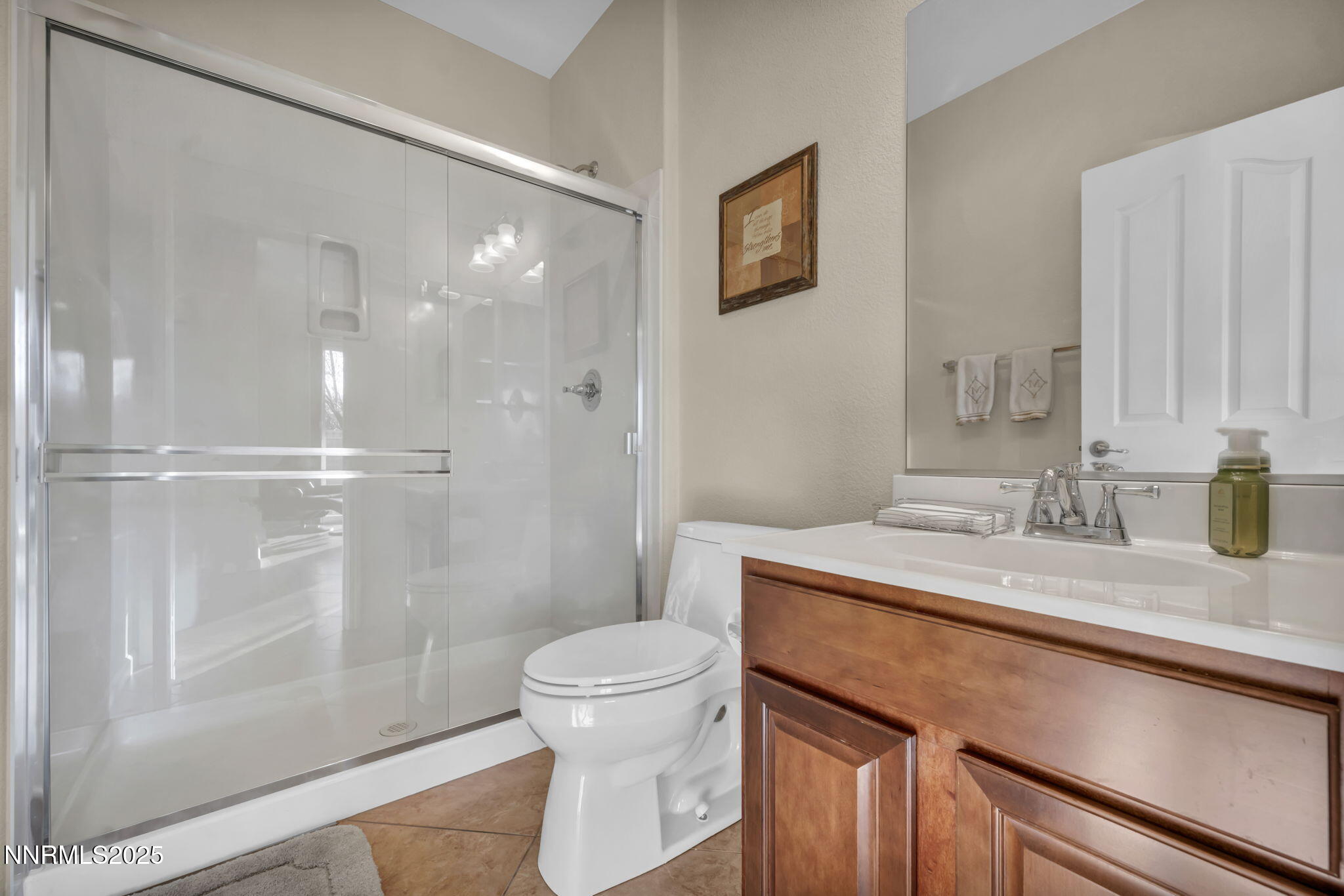 11375 Messina Court Reno, NV 89521 - Photo 31 of 52 a bathroom with a sink a toilet and shower