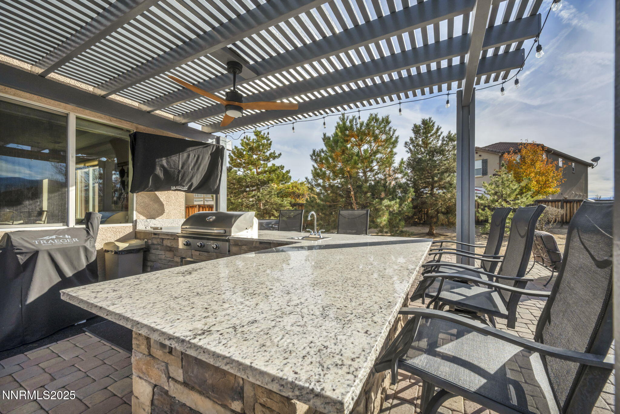 11375 Messina Court Reno, NV 89521 - Photo 34 of 52 a view of a patio with swimming pool