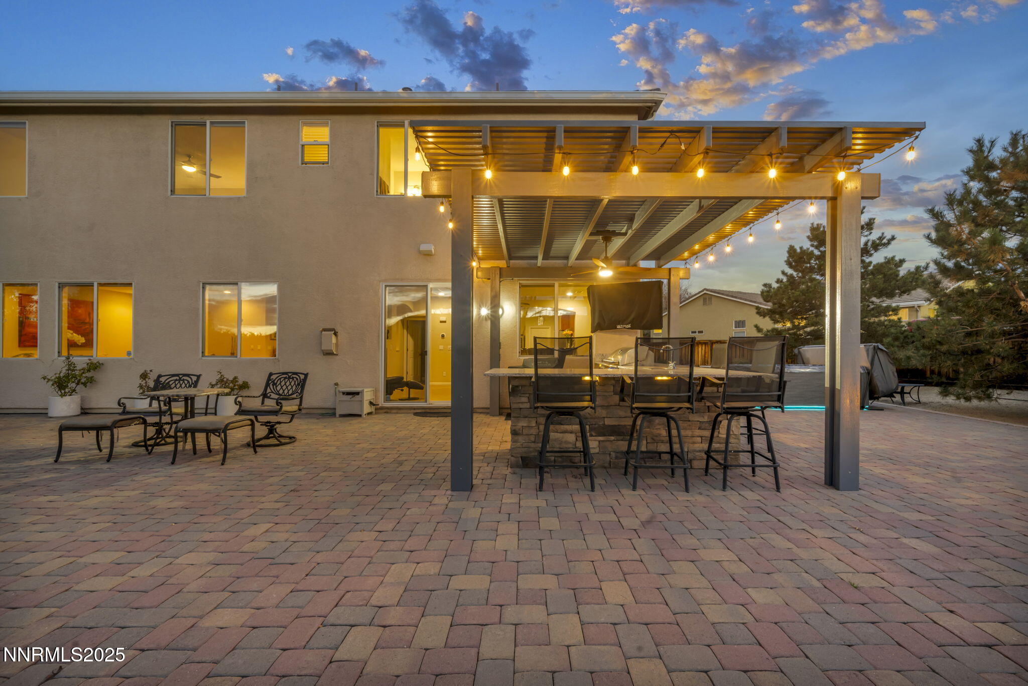 11375 Messina Court Reno, NV 89521 - Photo 41 of 52 a view of a patio with table and chairs