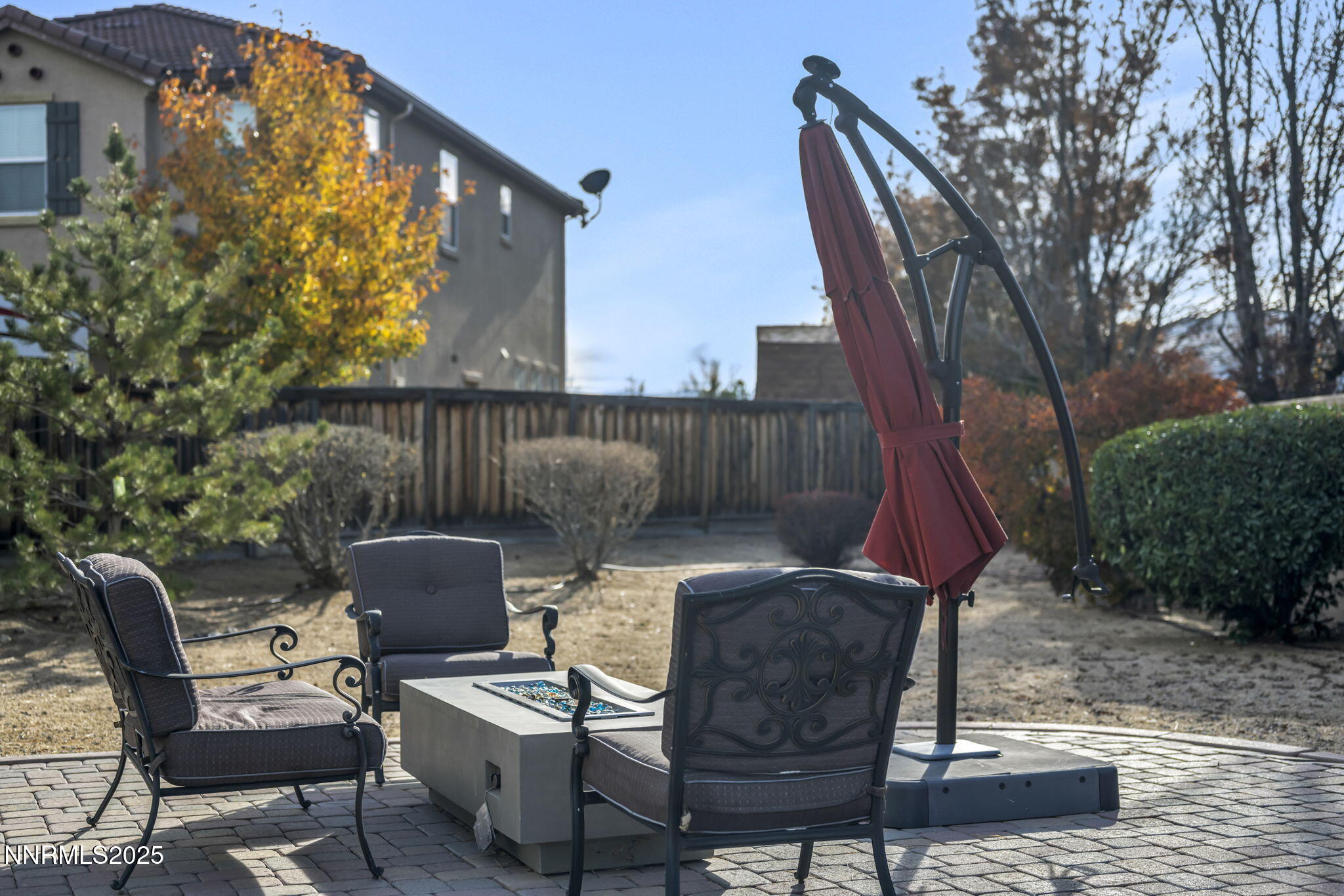 11375 Messina Court Reno, NV 89521 - Photo 44 of 52 a view of backyard with outdoor seating and trees