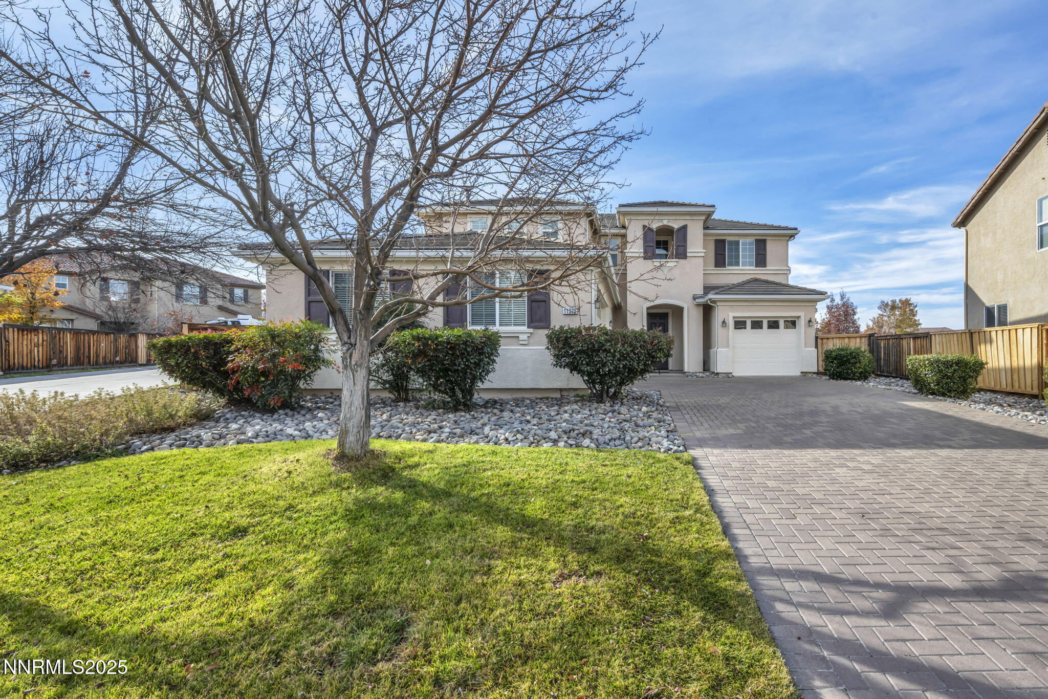 11375 Messina Court Reno, NV 89521 - Photo 5 of 52 a front view of a house with garden