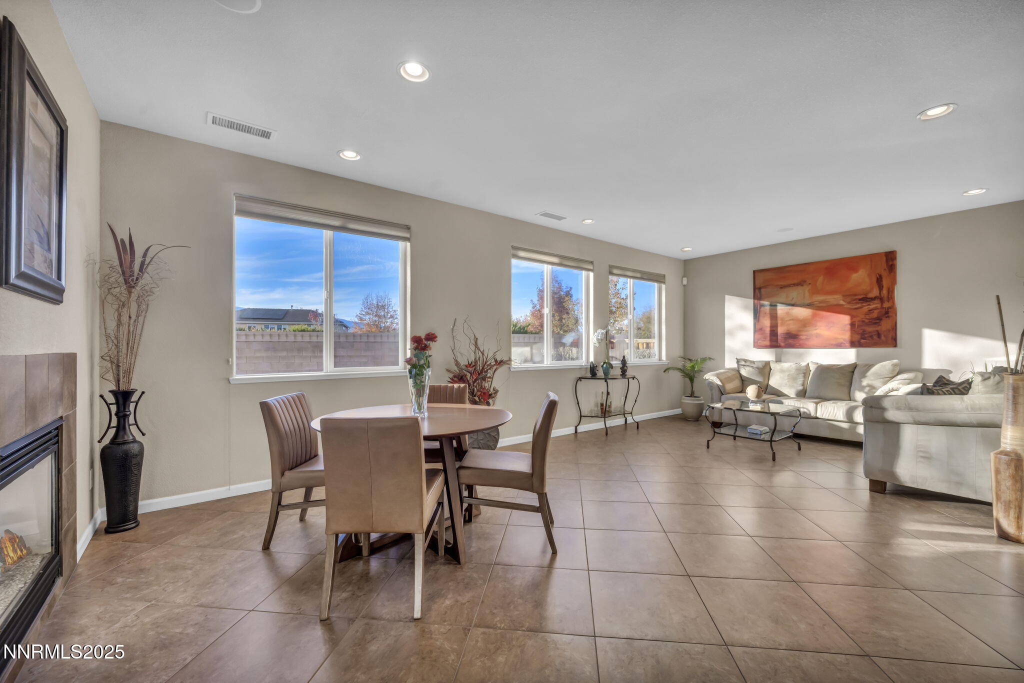 11375 Messina Court Reno, NV 89521 - Photo 7 of 52 a view of a dining room with furniture and a livingroom