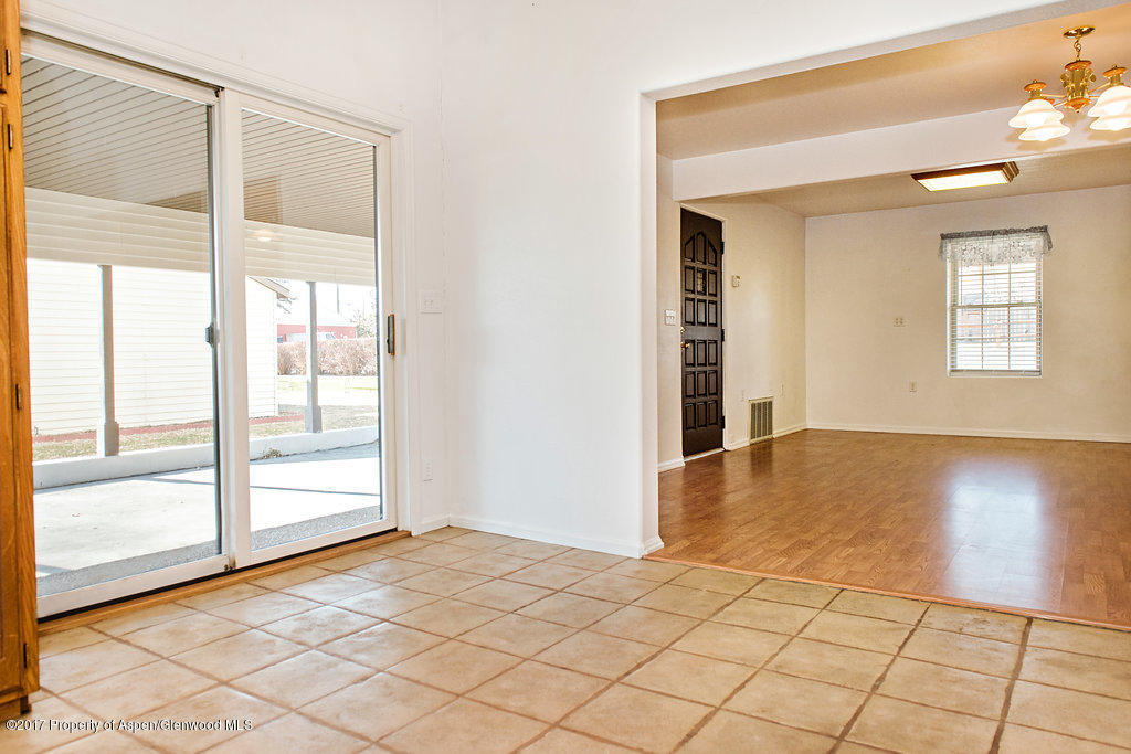 554 Jarrad Avenue Rifle, CO 81650 - Photo 5 of 21 a view of an empty room and window