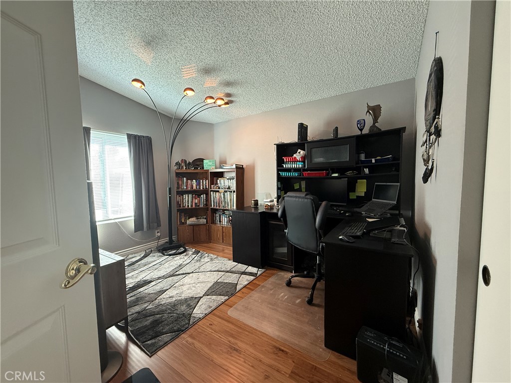 1550 Rory Lane Simi Valley, CA 93063 - Photo 14 of 26 a view of a workspace with furniture and closet