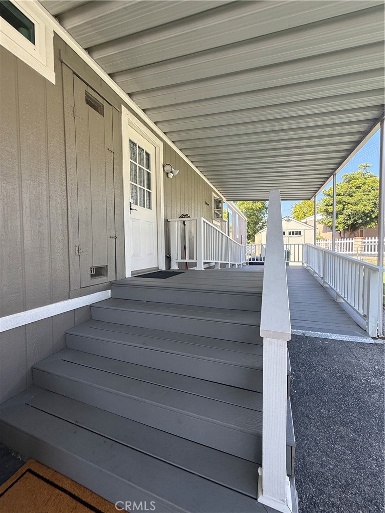 1550 Rory Lane Simi Valley, CA 93063 - Photo 16 of 26 a view of backyard with wooden deck and outdoor seating