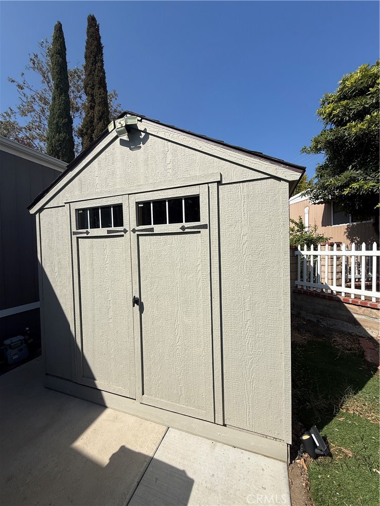 1550 Rory Lane Simi Valley, CA 93063 - Photo 19 of 26 a view of a small space in front of a house with wooden fence