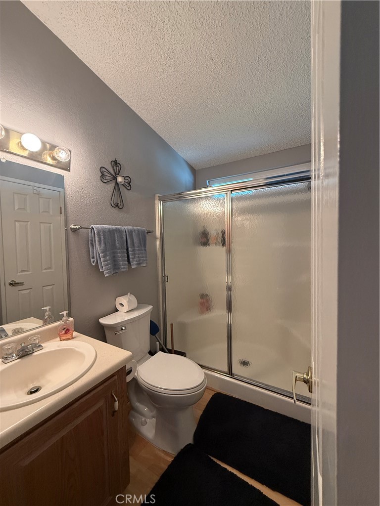 1550 Rory Lane Simi Valley, CA 93063 - Photo 21 of 26 a bathroom with a sink a toilet and shower