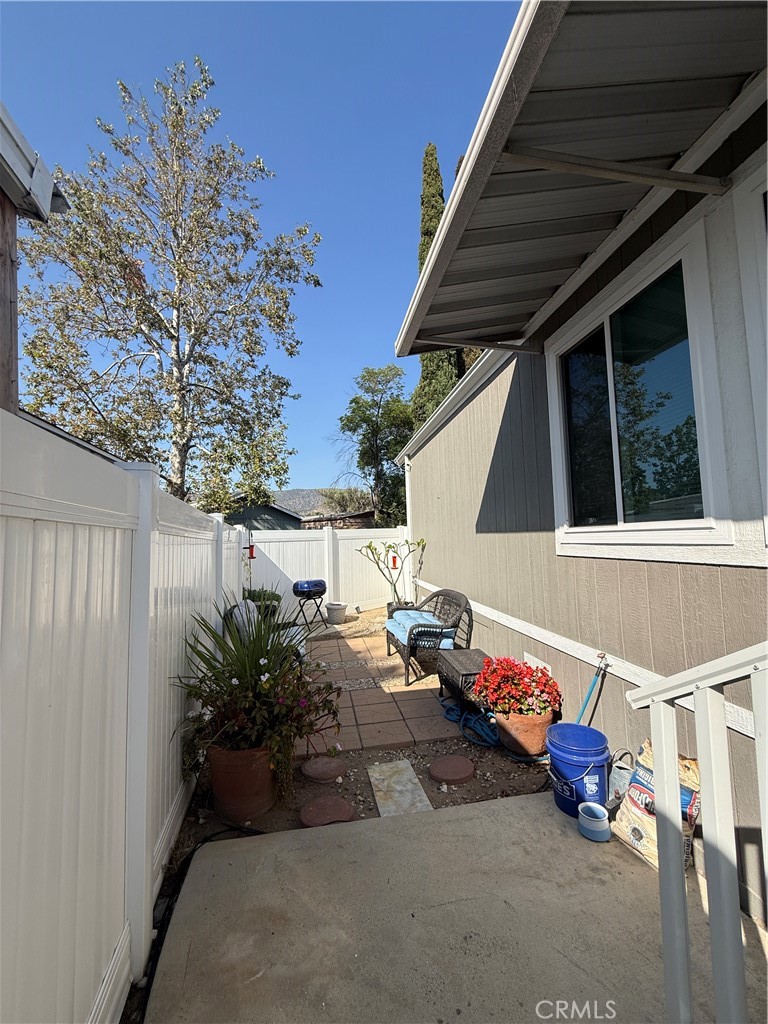 1550 Rory Lane Simi Valley, CA 93063 - Photo 22 of 26 a backyard of a house with outdoor seating