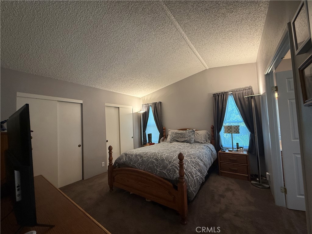 1550 Rory Lane Simi Valley, CA 93063 - Photo 8 of 26 a bedroom with a bed and a window