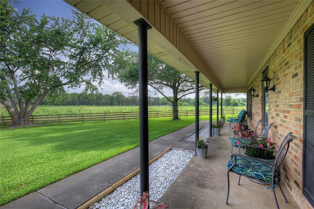 753 County Rd SW 3110 Mount Vernon, TX 75457 - Photo 4 of 40 Sit on your front porch and admire the oak and magnolia trees!