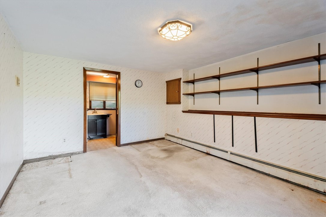 10 Midway Street Scituate, RI 02857 - Photo 15 of 35 Additional room, could be a den, office, view into full bath with Laundry