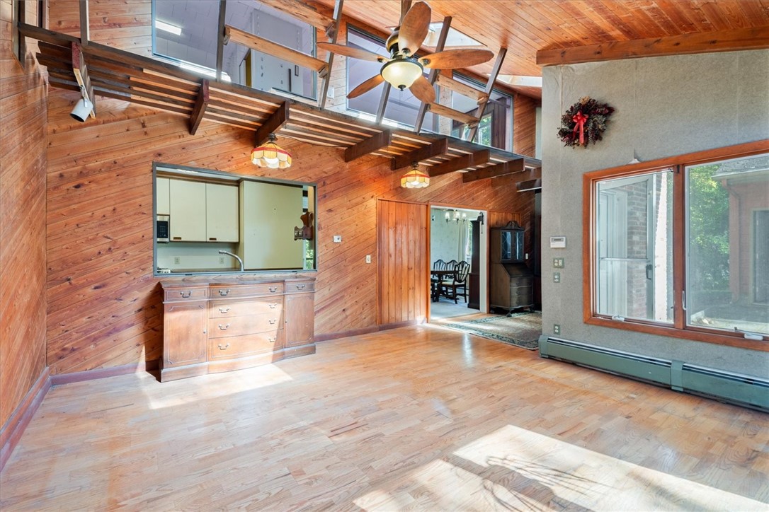 10 Midway Street Scituate, RI 02857 - Photo 2 of 35 With view into Kitchen, Foyer, Dining area, and loft space above.