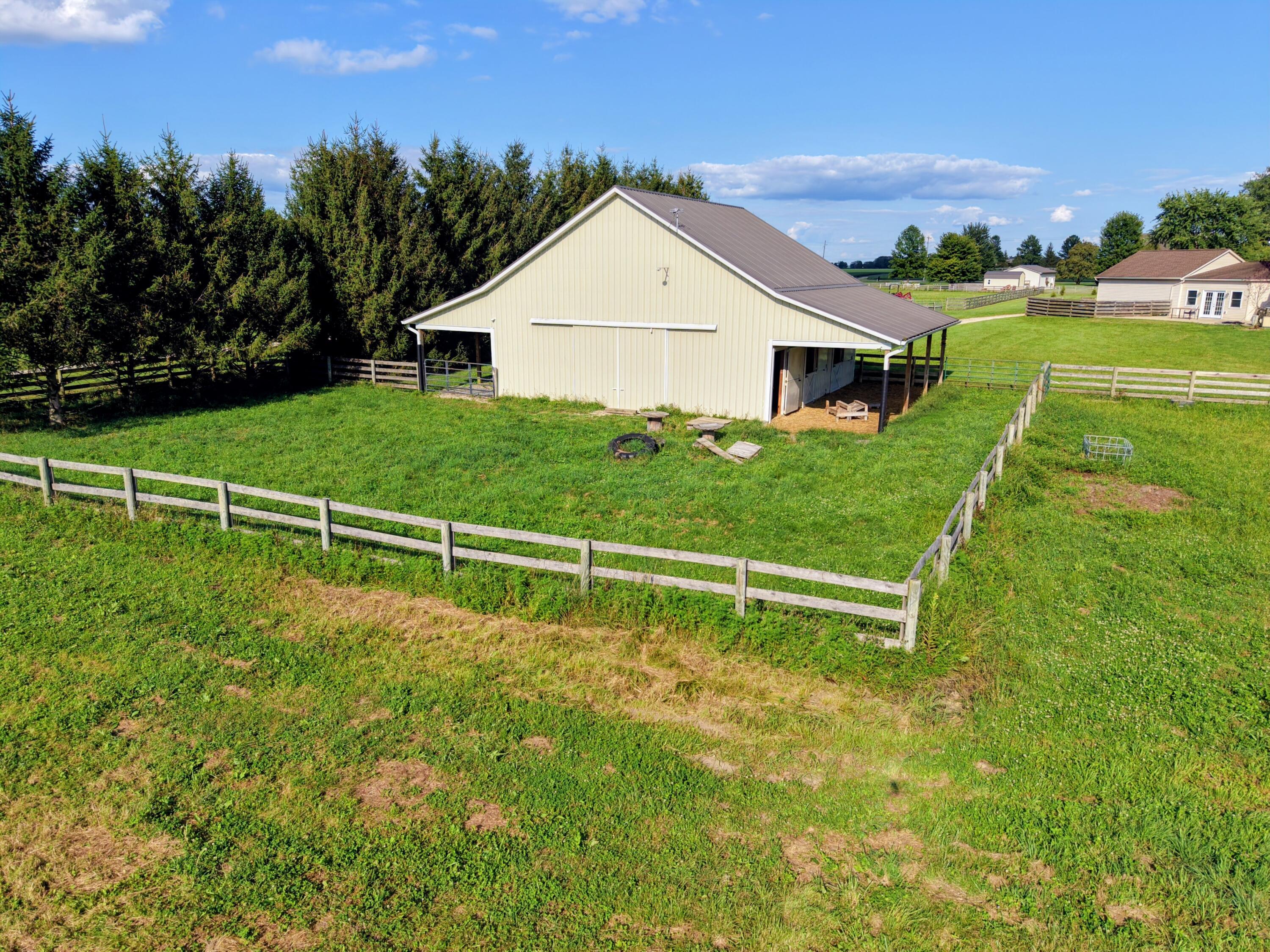 2313 Horseshoe Road Delaware, OH 43015 - Photo 8 of 75 dji_fly_20260729_175230_0295_17853636799