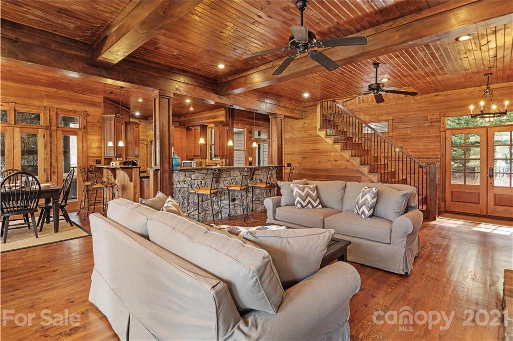 471 Chestnut Hill Loop Road Gerton, NC 28735 - Photo 12 of 45 a living room with furniture and wooden floor