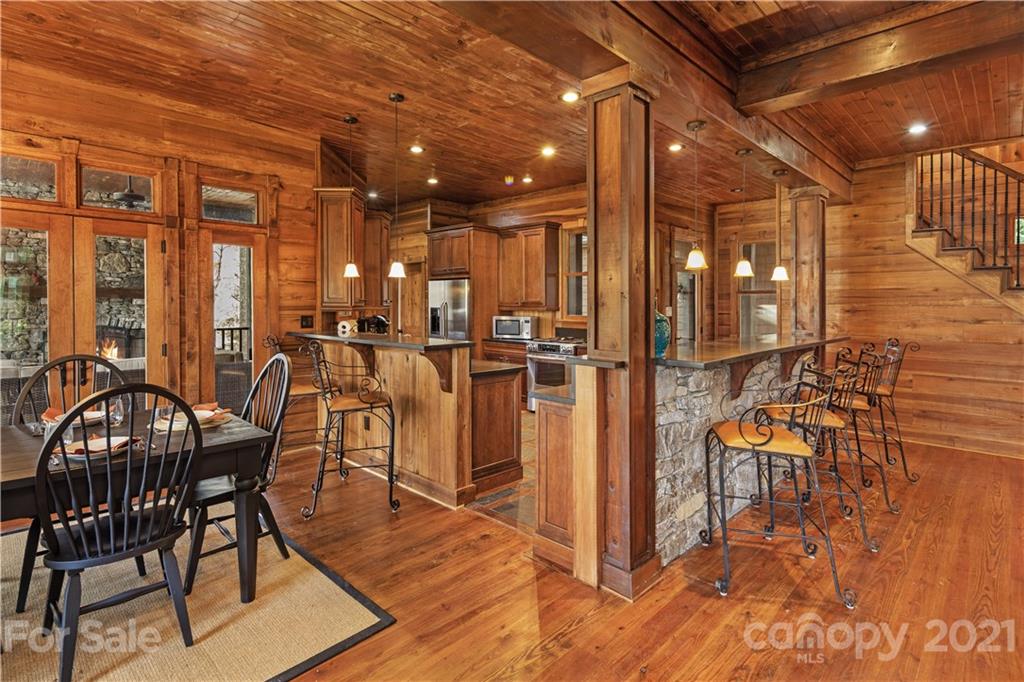 471 Chestnut Hill Loop Road Gerton, NC 28735 - Photo 17 of 45 a view of a dining room with furniture