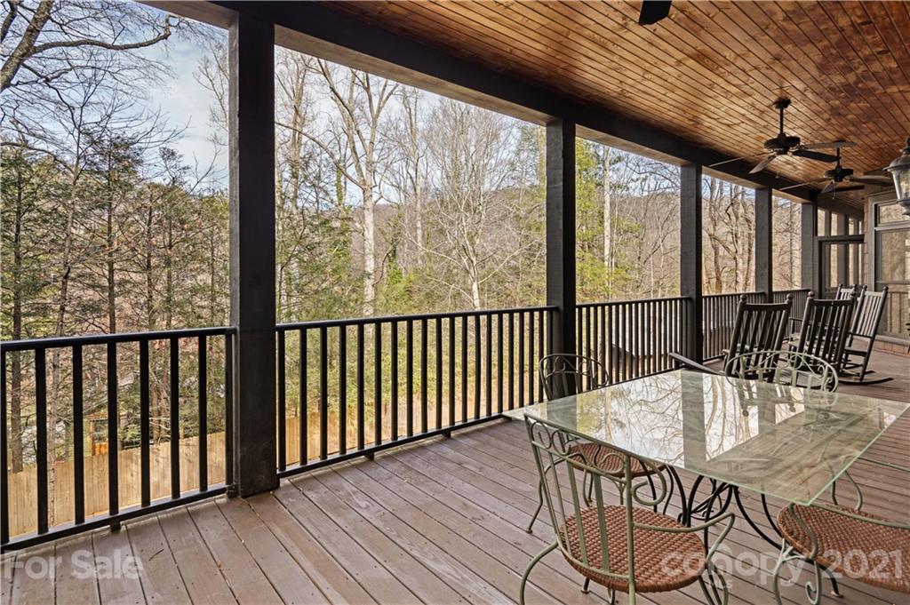 471 Chestnut Hill Loop Road Gerton, NC 28735 - Photo 28 of 45 a view of balcony with furniture