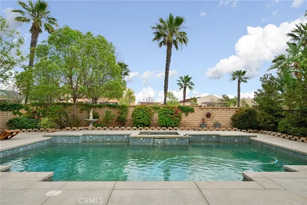 a view of a house with swimming pool