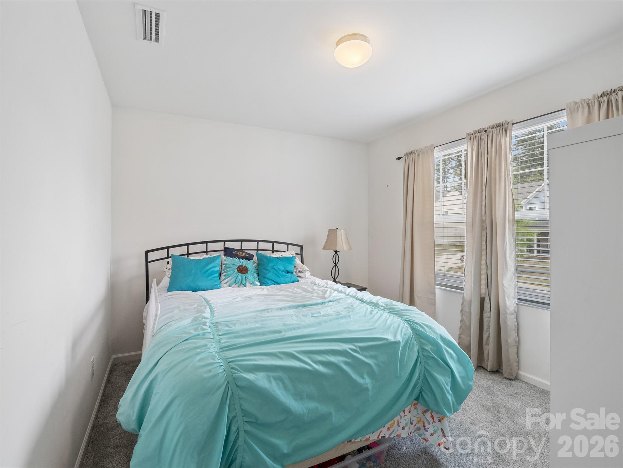 629 Gants Road York, SC 29745 - Photo 20 of 27 a bedroom with a bed and a window