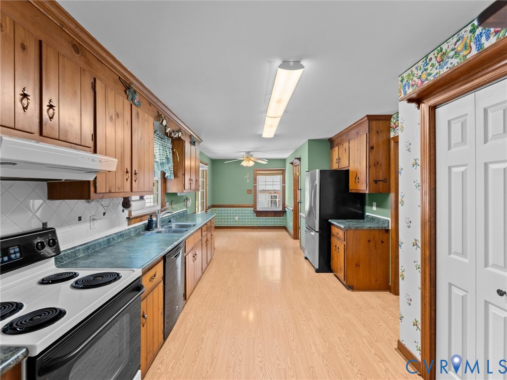 3524 Ludgate Road Chester, VA 23831 - Photo 16 of 44 Kitchen featuring wood cabinetry, light wood-finis