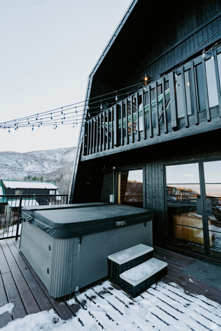 1413 Basel Drive Midway, UT 84049 - Photo 100 of 137 Snow covered deck with a hot tub and a mountain view