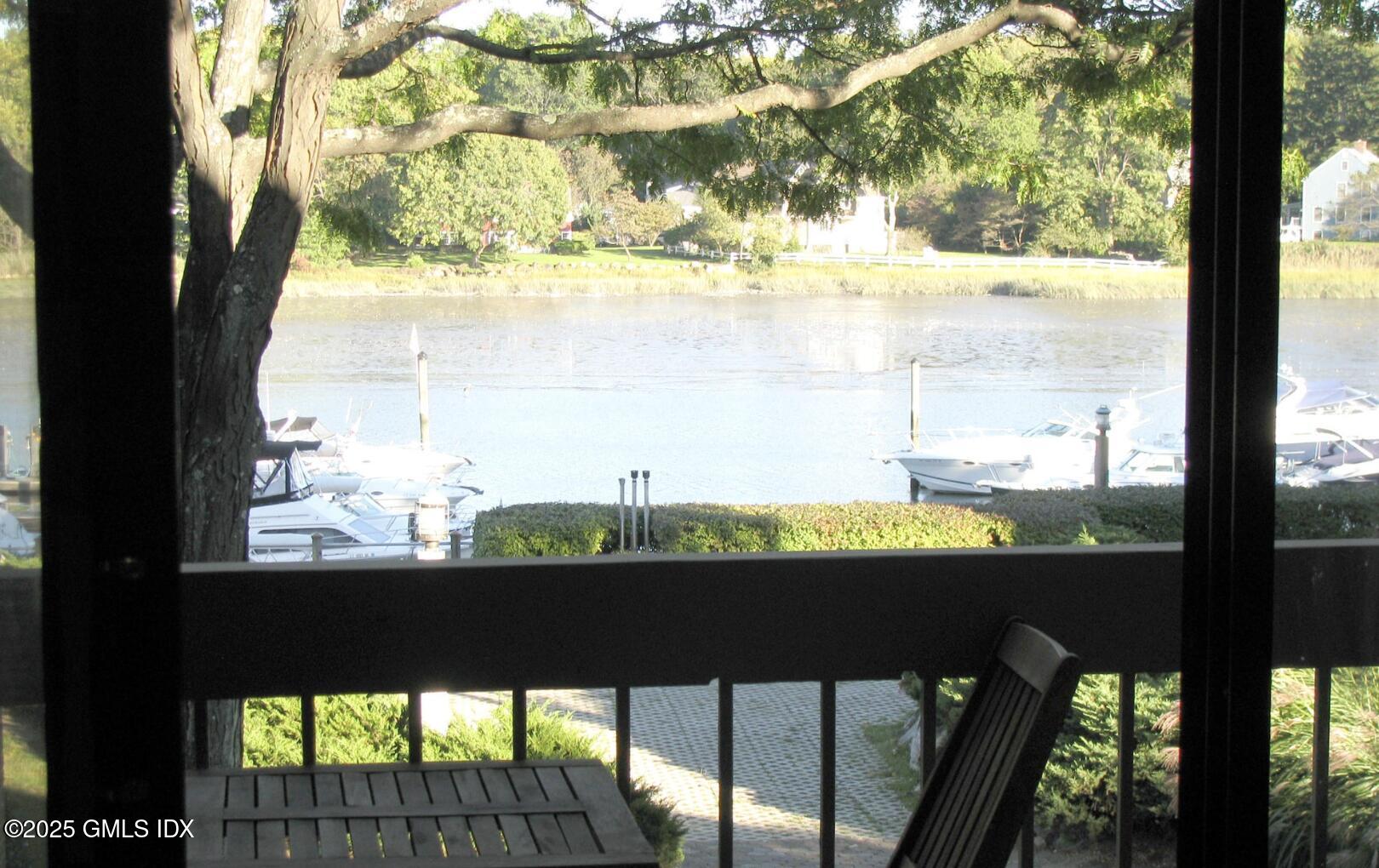 7 River Road, Unit 306 Cos Cob, CT 06807 - Photo 20 of 20 a view of a balcony with an outdoor space