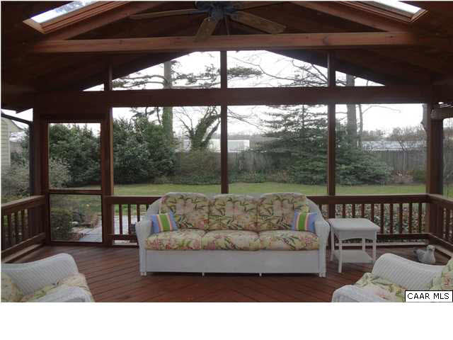 1436 Grove Road Charlottesville, VA 22901 - Photo 13 of 25 Screened porch with vaulted ceiling and fan.